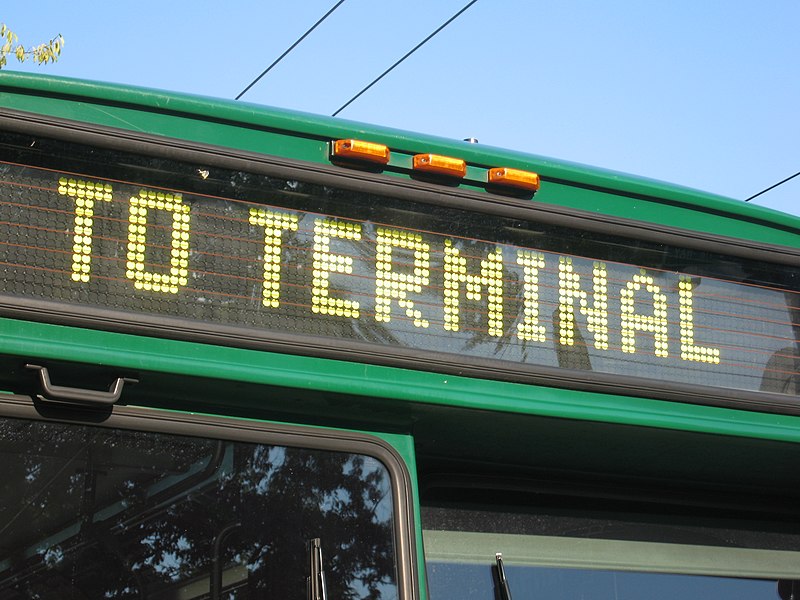 Picture of a flip-dot sign on a bus